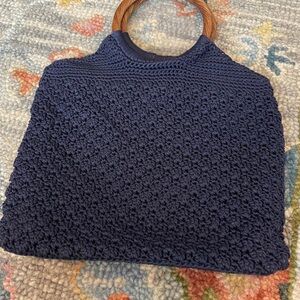 The Sak Dark Blue Crochet Clutch with Wooden Handles